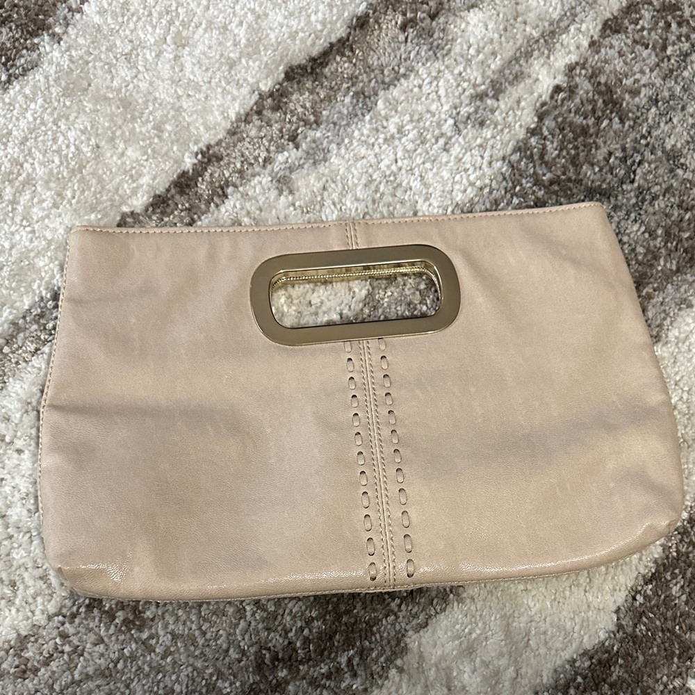 The Limited light tan clutch with gold accent new with tag